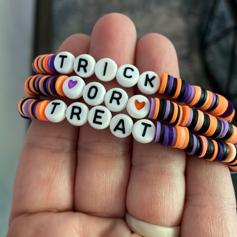 Set Of 3 Homemade Stretch Clay Bead Bracelets. Halloween Themed. A Great Addition To Your Halloween Attire. Purple, Orange And Black Colors That Say Trick Or Treat When Worn All Together. Halloween Bracelets For Kids, Clay Beads Bracelet Ideas For Halloween, Halloween Braclets Idea, College Clay Bead Bracelets, Fall Themed Beaded Bracelet, Clay Bead Bracelet Sets Ideas, Preppy Fall Bracelet Ideas, Halloween Glass Bead Bracelet, Clay Bead Bracelet Themes