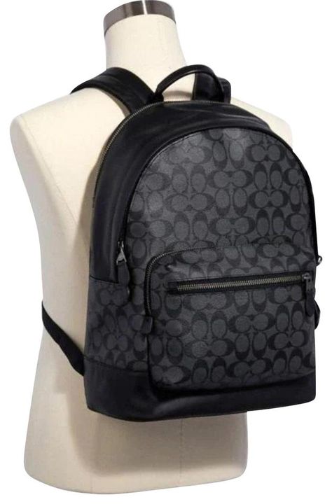 New & Vintage Coach Up to 70% Off Retail. Real or Your Money Back. Shipping & Returns Included. Coach 2736 Men's West Large Backpack Book Bag Brand new with Tags 100% Authentic Features: 2 Main Compartments 2 Outer Zip Pockets Top Handle Adjustable Shoulder Straps Color: Charcoal Black Material: Signature Coated Canvas with Smooth Leather Measures: 13 .75" L x 17.25" H x 6" D MSRP: $550.00 Canvas, Travel, Classic, Outdoor, Luxury, Designer  |  Tradesy is the leading used luxury fashion r Coach Bag Men, Mens Designer Backpacks, Soft Leather Backpack, Coach Backpack, Brown Backpacks, Coach Men, Brown Leather Backpack, Black Leather Backpack, Blue Backpack