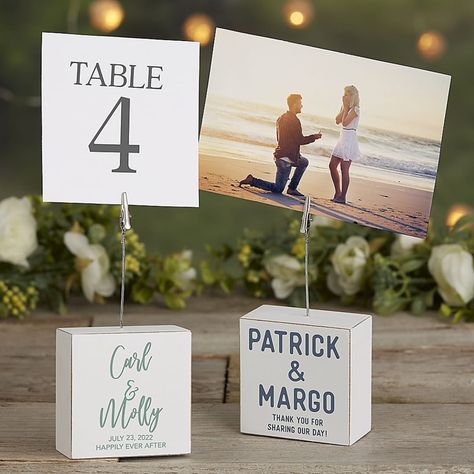 Personalizationmall Wedding Table Number Personalized Photo Clip Block - Display table numbers and photos at your Wedding or Bridal Shower with the Wedding Table Number Personalized Photo Clip Block. Personalized with choice of font and color, 2 names and 2 lines of text. Fall Sunflower Weddings, Photo Centerpieces, Personalized Picture Frames, Wedding Table Number, Display Table, Table Number Cards, Wedding Anniversary Party, Photo Clips, Wedding Games