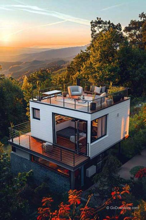 Meanwhile, the white exterior of this modern tiny house coupled with the clean lines and contemporary design of the roof deck creates a sleek and sophisticated look. Roof Decks, Small Beach Houses, Small Modern House Plans, Tiny House Luxury, Rooftop Terrace Design, Rooftop Design, A Frame House Plans, Small House Interior Design, Tiny House Inspiration