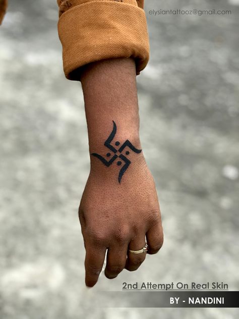 Tattoo by Nandiniat Elysian tattoos Bhopal. tattoo,piercing, makeup courses available. contact : 9039469612,8871715792 Om Swastik Tattoo, Swastik Design Tattoo, Swastik Tattoo, Swastik Design, Dragon Tattoo Arm, Simple Hand Tattoos, Hindu Tattoos, Trishul Tattoo Designs, Ganesh Tattoo