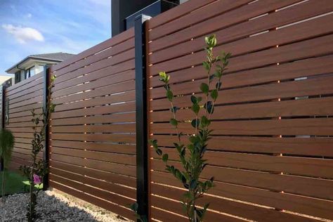 13 Best Timber Fence Ideas & Designs Slat Fence, Slatted Fence Panels, Modern Fence Design, Courtyard Gardens, Fence Designs, Privacy Fence Designs, Timber Slats, Front Fence, Brick Fence