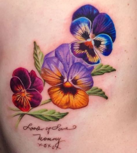 Petunia Tattoos For Women, Blue Pansy Tattoo, Small Flower Tattoo Color, Pansie Flower Tattoo, Flower Garden Tattoo Ideas, Lutos Flower Tattoo, Purple Pansy Tattoo, Floral Memorial Tattoo, Snapdragon Flowers Tattoo