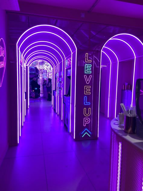 purple neon arcade aesthetic Club Venue Aesthetic, Cyberpunk Party Aesthetic, Purple Arcade Aesthetic, Neon Nightclub Aesthetic, Neon Arcade Aesthetic, Purple Aesthetic Neon, Neon Arcade, Cool Home Gadgets, Zigarren Lounges