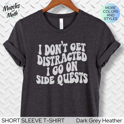 💖  Let your body speak your mind - I don't get distracted, I go on side quests.  This funny ADHD shirt is soft and comfortable to wear.  The retro wavy design is high quality that will last, making it the perfect gift for friends, family, coworkers, or YOU! SHORT AND LONG SLEEVE T-SHIRT PRODUCT SPECIFICATIONS .: 4.2 oz., Heather and Solid Blend colors - 52% airlume combed and ringspun cotton, 48% polyester, 32 singles .: Athletic Heather, Black Heather: 90% Airlume combed ringspun cotton, 10% p Tshirt Design Funny Shirt Ideas, Funny T Shirts For Women, Funny Work Shirts, Funny Cricut Shirts, Vinyl Designs For Shirts, Funny T-shirts, Funny Tshirt Ideas, Snarky Shirts, Funny Shirt Ideas