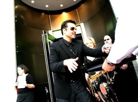 British pop star George Michael, who had strong ties to Dallas, dies at age 53 | Visual Arts | Dallas News  photo: George Michael in 2005 outside of Goss Gallery on Cedar Springs in Dallas (Courtney Perry/Special Contributor) George Michael, Record Producer, Pop Star, Visual Arts, Songwriting, Springs, Visual Art, Dallas, The Outsiders