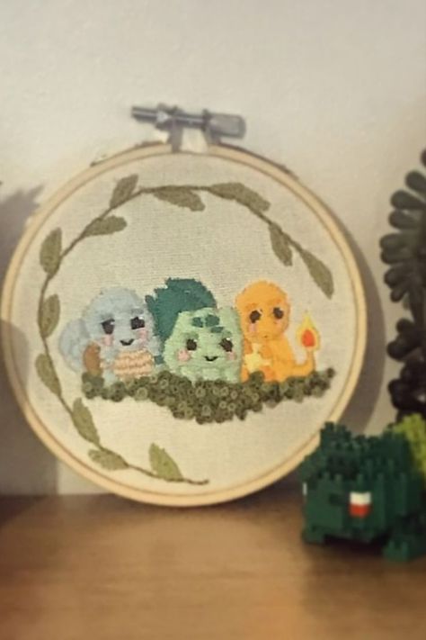 Embroidery Design Hoop featuring Squirtle, Bulbasaur and Charmander from Pokemon. Great as DIY Home Decor or a cute gift to add to a plant shelf! Digital PDF Pattern is now available on Etsy! Pokemon Embroidery Pattern, Blissey Pokemon, Embroidery Pokemon, Pokemon Embroidery, Embroidery Design Hoop, Pokemon Design, Plant Shelf, Plant Shelves, Embroidery Art