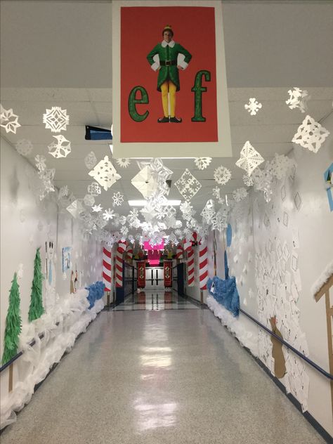 Snow flakes from ceiling made from paper. Snow flakes on wall made from coffee filters. Snowflakes made by students. Ceiling Snowflake Decorations, Christmas Ceiling Decorations Ideas Classroom, Christmas Hallways School, School Christmas Themes, Christmas Decorating Themes Office, Christmas Themed School Hallways, Winter Wonderland Decorations For School Hallway, School Cafeteria Christmas Decorations, Cafeteria Christmas Decorations