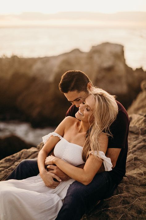 Engagement photos in Malibu! Can't go wrong. White flowy dress, blonde hair blowing in the wind, so so beautiful! Inside and out. Engagement Photos With Pink Dress, Flowy Dress Engagement Pictures, White Dress Beach Photoshoot Couple, Sunrise Engagement Pictures, Couples Beach Photoshoot, Flowy White Dress, Engagement Pictures Beach, Engagement Shoots Poses, Engagement Beach