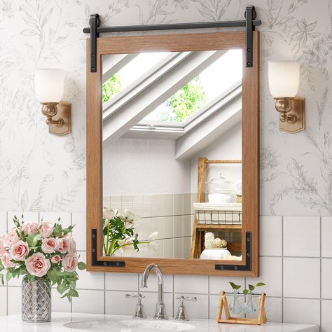 PRICES MAY VARY. Please Note: The overall size is 32 x 24 x 0.67 inches, and the display size of the glass mirror surface is 24.7 x 18.6 inches. The iron bracket hardware of the mirror' top is non-sliding. It means that the mirror will not move left or right along the track Rustic and Vintage Design: Mestikits farmhouse bathroom mirrors feature a classic style with a wooden frame enhanced by the small black metal details. The brown farmhouse style mirror is a blend of rustic and modern, and it w Rustic Vanity Mirror, Rustic Bathroom Mirror Ideas, Farmhouse Bathroom Mirror, Living Room Courtyard, Barn Mirror, Barn Wood Mirror, Mirror And Sconces, Farmhouse Bathroom Mirrors, Wall Decor Mirrors