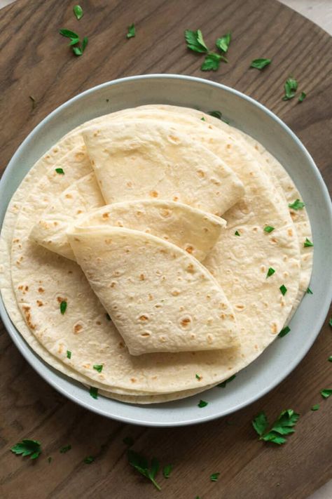 These keto tortillas are made with almond flour and have a soft and pliable texture, you won't believe how easy they are to make! Made with just 3 main ingredients, these wraps are perfect as sandwiches, quesadillas, pizzas, and more! 2 grams net carbs per serving. Keto Tortilla Wraps Recipe, Homemade Keto Wraps, Psyllium Husk Wraps, Psyllium Husk Tortillas, Homemade Keto Tortillas, Keto Wrap Recipes, Almond Flour Tortillas 3 Ingredients, Keto Burrito Wrap, Keto Wraps Low Carb