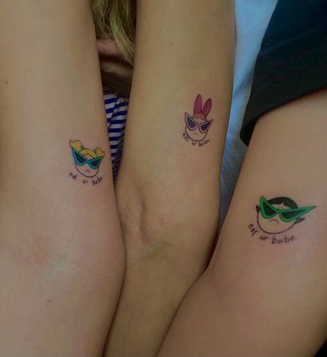 70+ matching tattoo designs you should check out. Choose one and show it to your soulmate immediately! Bonus: detailed analysis of design meanings. Powerpuff Bubbles Tattoo, Powderpuff Girls Tattoo Ideas, Blossom Powerpuff Tattoo, Bubbles Tattoo Powerpuff, Bubbles Powerpuff Tattoo, Buttercup Powerpuff Tattoo, Buttercup Tattoo Powerpuff, Powerpuff Tattoo, Powerpuff Girls Tattoo