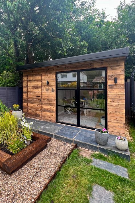 A garden office provides a quiet, dedicated area with serene garden views, allowing you to work more efficiently away from household distractions. Plus, they're quick to build—usually within just 20 days for simpler designs. Click to see more of this stunning home office.  #intothegardenroom #homeoffices #gardenoffices #gardenrooms⁠ Home Office In Garden, Garden Office And Shed, Garden Room With Storage, Outdoor Shed Office, Small Garden Office Ideas, Garden Cabin Interior, Office Sheds Backyard, Outdoor Office Space, Garden Office Ideas