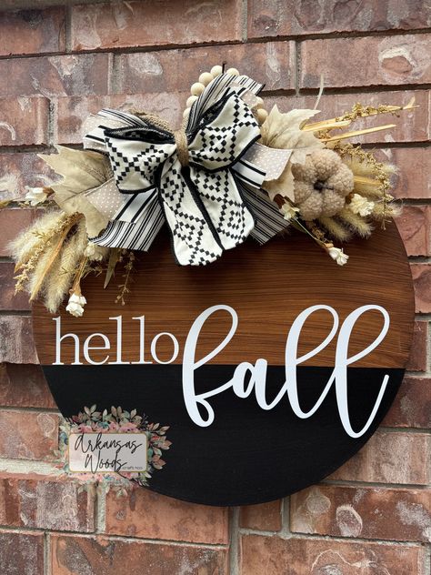 Wanting to stay away from the traditional "fall wreath"? Our newest Hello Fall Farmhouse Door Hanger is the perfect route to go! Complete with hand painted detailing, new beautiful textured fall foliage, your choice of wording, and complete with the perfect accent of a boho-inspired bow! This is the perfect staple piece for anyone who loves simple statement pieces, boho inspired, farmhouse-style decor, or beautiful fall foliage to accent any door or porch! >>Select your size to best meet your needs! 18 inch round or 22 inch round.  These are perfect for indoor/outdoor usage!  >> MATERIALS: All of our door hangers are hand designed/cut and made with a high quality 1/2 inch thick MDF wood. This wood will not warp or splinter with time or weather unlike other woods such as plywood. These will Hobby Lobby Pumpkin Door Hanger, Simple Fall Door Hangers, Hey Pumpkin Door Hanger, Boho Fall Door Hangers, Autumn Door Hangers, Fall Wood Door Hangers, Simple Fall Decor Front Doors, Hello Fall Door Hanger, Fall Door Signs