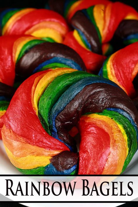 A platter of brightly coloured homemade rainbow bagels. Rainbow Bagel Recipe, Pride Brunch, Ukrainian Easter Bread, Rainbow Bagels, Rainbow Baking, Minnesota Food, Bagels Recipe, Ukrainian Easter, Homemade Bagels