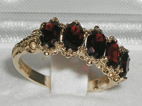 Five Stunning Fiery Red Garnets set within this delightful English Victorian style Gold setting. Each Garnet measures approx 6x4mm (0.24"x0.16"), is securely claw set, and the setting has a nice solid feel with a substantial shank.Completely made from Solid English Yellow 10K Gold, tested and Hallmarked by the Assay Office which confirms the purity of the Gold. The Hallmark includes the .417 marking plus the unique mark of the Assay Office.These are Genuine Natural Garnets. They glow with a warm Victorian Style Rings, Filigree Engagement Ring, Carved Ring, Precious Opal, Ancient Mysteries, Garnet Jewelry, Garnet Rings, Dream Jewelry, Natural Opal