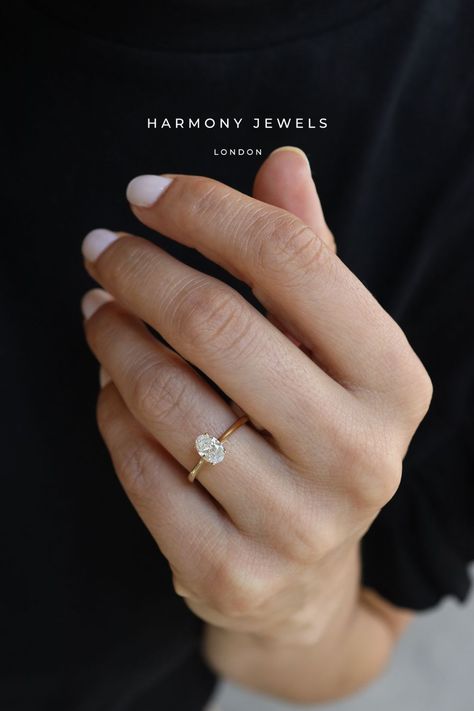 You're aware that if you say YES, you'll have a wedding to plan, aren't you? 👰🏽‍♀️ And this exquisite Oval Solitaire engagement ring will continuously remind you that it was a splendid decision to make! ✨💍 Plain Gold Band Engagement Rings Simple, Swarovski Engagement Ring, Traditional Engagement Rings Simple Gold, Small Engagement Rings Gold, Oval Engagement Ring Small, Basic Engagement Rings, Simple Classy Engagement Rings, Small Oval Engagement Ring, Old Money Wedding Ring