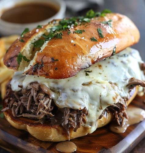 This Crockpot French Dip Recipe is so tender and delicious. My family loves this meal and the crock pot makes it super easy to enjoy. This Crock pot French Dip recipe is family favorite and we enjoy it year round. My mouth is watering just thinking about these sandwiches. You might also like French Dip Sliders. You can also make Instant pot French Dip Sandwiches Recipe for another delicious variation. Check out more easy beef recipes for the perfect weeknight meal. We love making slow cooker ... Beef Sandwiches Crock Pot, Crockpot French Dip, French Dip Recipe, Crock Pot French Dip, French Dip Sandwich Crockpot, French Dip Recipes, Instant Pot French Dip, French Dip Crock Pot, French Sandwich