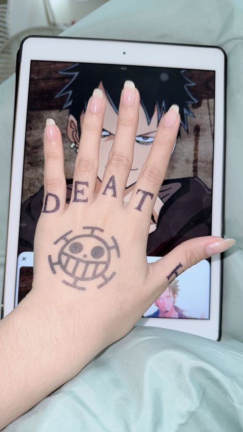 law hand tattoo one piece trafalgar law tattoo Tato Law One Piece, Laws Hand Tattoo, Law One Piece Hand, Tato Law, Law Tattoo One Piece Hand, Law Tatoos One Piece, Trafalgar Law Hand Tattoo, Anime Hand Tattoo Ideas, Laws Tattoos One Piece