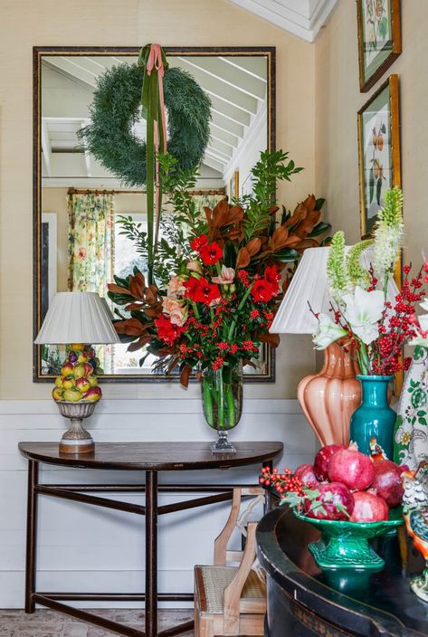 Take a Peek at James Farmer's Stunning Holiday Homestead! James Farmer Christmas Decor, Pomegranate Flower Arrangement, James Farmer Interiors, Wreath On Mirror, Holiday Home Design, Juniper Wreath, Christmas Amaryllis, Magnolia Arrangement, Amaryllis Arrangement