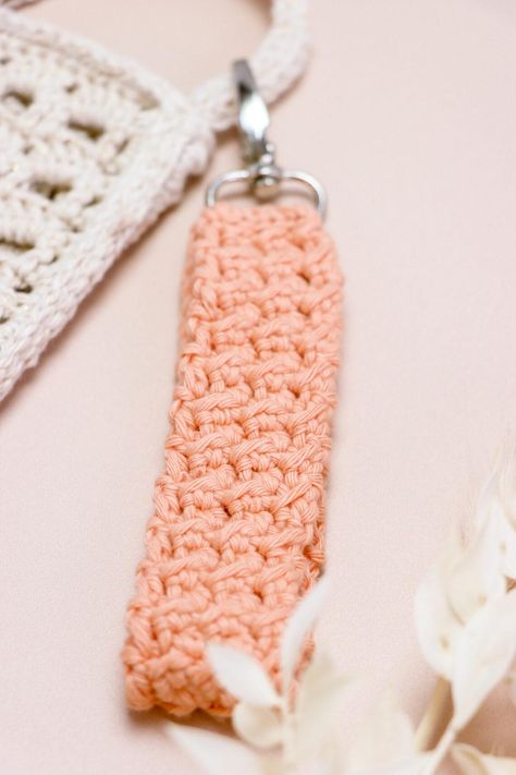 Learn to Crochet a Quick & Easy Wristlet Keychain - Bella Coco Crochet Easy Crochet Wristlet Keychain, Crochet Tassle Keychain, Crochet Wrist Lanyard, Key Fob Crochet Free Pattern, Wristlet Crochet Pattern, Crochet Key Chains Tutorial, Free Crochet Wristlet Pattern, Crochet Bow Keychain Pattern, Crochet Keychain Wristlet Pattern Free