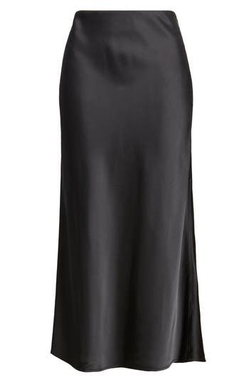 Complete your look with the understated sophistication of this smooth satin midi skirt. 32" center front length ( size Medium) Unlined 54% polyester, 46% rayon Machine wash, line dry Imported Notion Wishlist, Satin Black Skirt, Corporate Clothes, Minimalist Winter Wardrobe, Midi Satin Skirt, Black Satin Midi Skirt, Winter Essentials Clothes, Black Midi Pencil Skirt, Autumn Styles