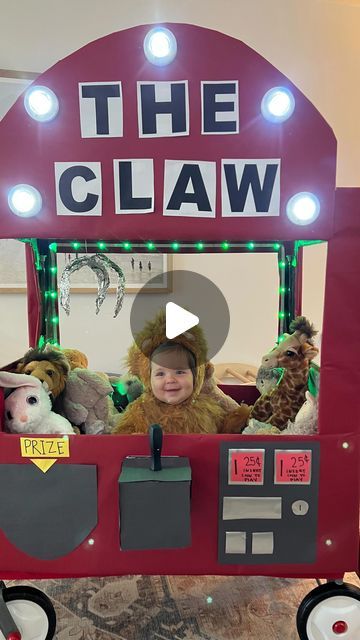 8.2M views · 720K likes | Kenzie & Carol Carter on Instagram: "THE CLAW 👻🎃 Elle’s first Halloween costume! 🦁Had so much fun recreating this idea I saw on Tik Tok! 🤍what are y’all dressing up as?!   Inspo from Tik Tok video creator(@ angelina_lesliemarie )🤩 #babyhalloweencostume" Claw Machine Costume Wagon, The Claw Halloween Costume, Claw Machine Halloween Costume, The Claw Costume, Wagon Halloween Ideas, Claw Machine Costume, Wagon Costume, Claw Game, First Halloween Costumes