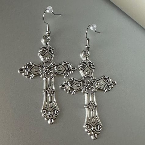 Brand New Without Tag! Lovely Silver Toned Gothic Style Catholic Cross Drop Earrings! Made Out Of Zinc Alloy Metal. Excellent Brand New Condition! Never Been Worn! Length Is Aprox. 2 1/2" Tags: Fairycore Coquette Boho Cute Kawaii Whimsigoth Witch Witchy Goth Punk Gothic Cottagecore Style Boho Bohemian Hippy Hippie Lovely Girly Fashion Trendy Love Lovely Girly Fall Autumn Chic Retro Unique Vtg Pretty Beautiful Nasty Gal Urban Outfitters Lf Uo Brandy Melville Dolls Kill Unif Omighty Hot Topic Topshop Asos Pastel Grunge Fairy Fairycore Aesthetic Retro Chic Bride Party Dance Festival Rave Club Festive Holiday Classic Timeless Minimalist Minimal Mid Century Midcentury Modern Gypsy Capsule W Grunge Cross Earrings, Big Cross Earrings, Gothic Cross Earrings, Dangle Earrings Men, Whimsigoth Witch, Silver Cross Earrings, Vintage Silver Earrings, Antique Silver Earrings, Gothic Cross