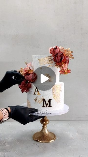 Pooja Nanda Sareen on Instagram: "A quick video tutorial of a white and gold 50th Wedding Anniversary Cake with 24K gold leaf and stencil art.
.
.
Products used
Fondant @magiccoloursindia 
Stencil @cakesbyangelamorrison 
Gold initials @thepartyglitter 
Anti skid mat @nycake 
White drumboard @7sugarlane 
.
.
.
.
.
#cake #50thanniversary #goldandwhite #cakevideo #videotutorial #caketutorial #cakesofinstagram #delhibakers #bakersofindia #caketrends #whitecake #confiteria #sugarfanciesbypooja #oddlysatisfying" 50th Wedding Anniversary Cakes, 50th Anniversary Cakes, Wedding Anniversary Cake, Cake Trends, Cake Videos, 50th Wedding Anniversary, 50th Wedding, Anniversary Cake, Art Products