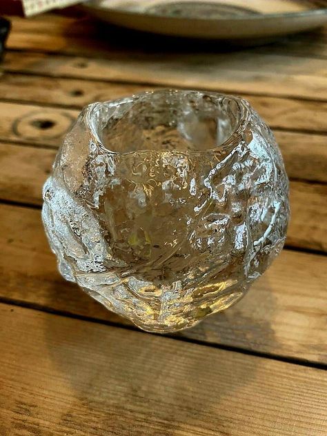 Evocative of Swedish winters, this crisp glass votive glows with warmth when alight. Designed by Ann Wärff in 1973, The Snowball has become a design classic and Kosta Boda's all-time best seller . One piece  Medium   H 70 mm               Total weight  0.792 Gr                ❄️❄️❄️   ❄️❄️❄️ Kosta Boda, Glass Votive, Dinner Table, Soft Lighting, A Romantic, Glass Collection, Best Seller, Electronic Accessories, Lighting