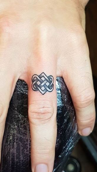 <<Check out more Celtic tattoos  #tattoomenow #tattooideas #tattoodesigns #celtic #celticknots #knots #love Forever Knot Tattoo, Celtic Knot Wrist Tattoo, Celtic Love Knot Ring Tattoo, Celtic Lovers Knot Tattoo, Irish Love Knot Tattoo, Celtic Key Tattoo, Celtic Eternity Knot Tattoo, Celtic Love Tattoo, Irish Finger Tattoo