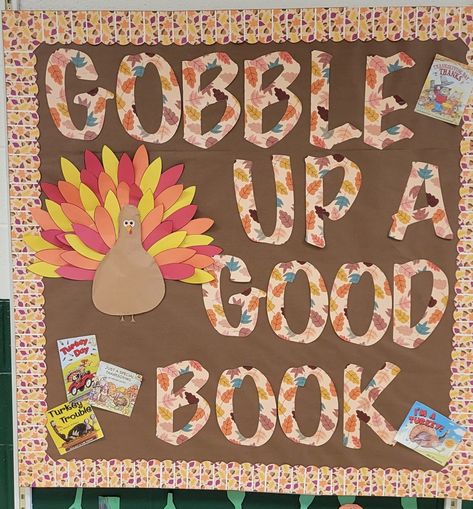 Fall Themed Library Bulletin Boards, Thanksgiving Reading Bulletin Boards, Gobble Up A Good Book Bulletin Board, November Bulletin Boards For Library, Thanksgiving Library Bulletin Board Ideas, Thanksgiving Bulletin Board Ideas For Library, Fall Decorations For Library, Library Holiday Bulletin Boards, Thanksgiving Poster Board Ideas