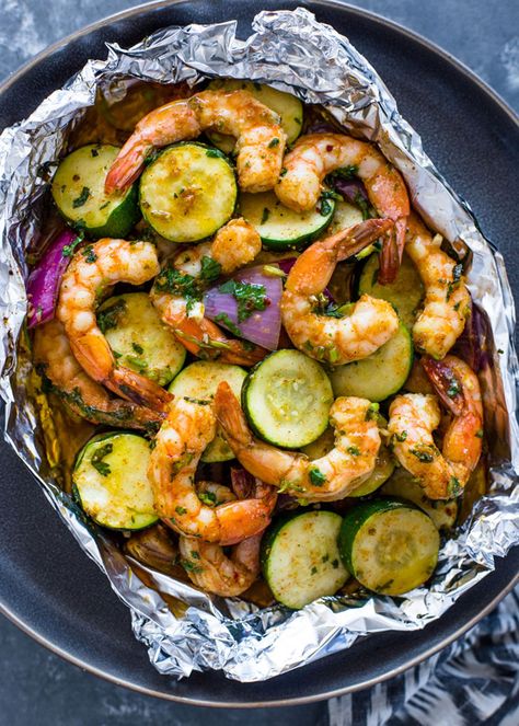 Garlic Shrimp and Veggie Foil Packscountryliving Shrimp And Zucchini, Foil Wraps, Gimme Delicious, Comidas Keto, Foil Pack Meals, Foil Packet Meals, Cilantro Sauce, Foil Packets, Garlic Shrimp