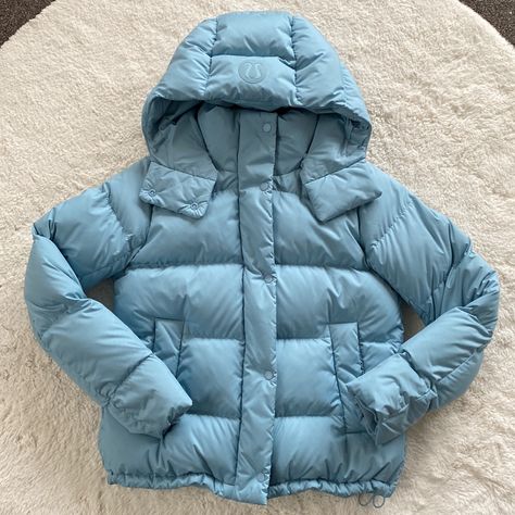 Lululemon Wunder Puff Jacket Nwt New With Tags Size 2 Light Blue This Wonderfully Warm Down Puffer Has A Cinchable Waist And Hem That Lets You Customize The Shape And Keep Out Cold Drafts. Removable Hood Cinch The Interior Waist And Hem Drawcord To Customize Your Fit Zippered Hand Pockets With A Hidden Phone Sleeve Interior Pockets Hold The Essentials Close-Fitting Interior Cuffs Help Hold In Heat Relaxed Fit Feels Roomy And Can Be Worn Over Larger Layers Water-Repellent, Softmatte Fabric 600-Fi Lululemon Puffer Jacket, Light Blue Puffer Jacket, Light Blue Coat, Poofy Sleeves, Light Blue Jacket, Movie Outfits, Blue Puffer Jacket, Winter Puffer Jackets, Hiking Jacket