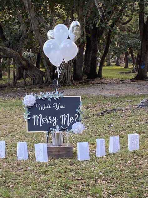 Wood chalkboard board decorated with green leaves and white wedding flower bouquet, white vinyl and message: Will you marry me?  Size: 35”wide x 25” tall  Special request $100 Production 3-5 business days. Will You Marry Me Poster Board Ideas, Will You Marry Me Aesthetic, Marry Me Sign, Proposal Decor, White Wedding Flowers Bouquet, Aesthetic Home Decor Ideas, Design Home Ideas, Romantic Marriage, Unique Proposals