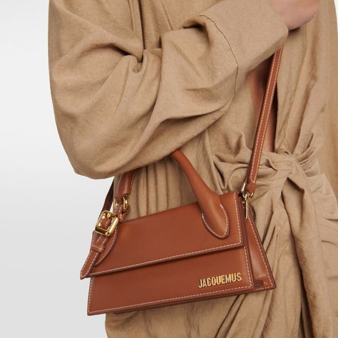 Step out in style with the Jacquemus ‘Le Chiquito’ Long Bag. This statement piece is not just a bag; it’s an accessory that transforms any outfit! 👜✨ Shop from our link in the Bio! . . . . #Jacquemus #LeChiquito #FashionStatement #LuxuryStyle #BagGoals #ChicAccessories #OOTD #FashionInspo Jacquemus Le Chiquito Long, Le Chiquito Long, Jacquemus Le Chiquito, Registered Nurse, Brown Bags, Chic Accessories, French Fashion, Contrast Stitch, A Bag