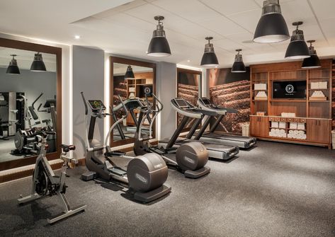 Gray Herringbone Tile Floor, Gray Herringbone Tile, Boutique Gym, Portland Hotels, Desain Pantry, Hotel Gym, Exercise Room, Gym Room At Home, Gym Interior