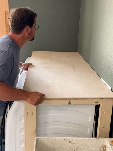 Washer And Dryer Table, Laundry Room Oak Cabinets, Diy Laundry Table Over Washer And Dryer, Garage Laundry Makeover, Laundry Counter Over Washer And Dryer, Washer And Dryer In Hallway, Diy Laundry Cabinet How To Build, Laundry Cabinets Diy, Washer And Dryer Top Cover