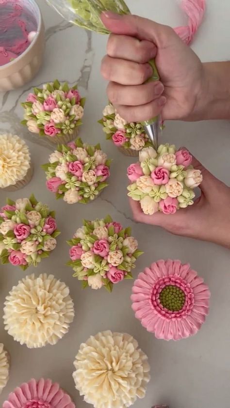 Spring is here and flower cupcakes are always a favorite choice! | spring, cupcake | Spring is here and flower cupcakes are always a favorite choice! | By MetDaan Cakes - Facebook | Spring is in the air and we've got the ultimate cupcake decorating idea to match. The floral buttercream piping gummies cupcakes is almost too beautiful to eat. This is like edible art. You'll have a blast trying out this new idea. Pretty Cupcakes Ideas Beautiful, Flowers Cupcakes Ideas, Spring Cupcakes Easy, Flower Cupcake Decorating Ideas, Spring Inspired Cupcakes, Garden Party Cupcake Ideas, Flower Garden Cupcakes, Flower Mini Cupcakes, Wildflower Themed Cupcakes