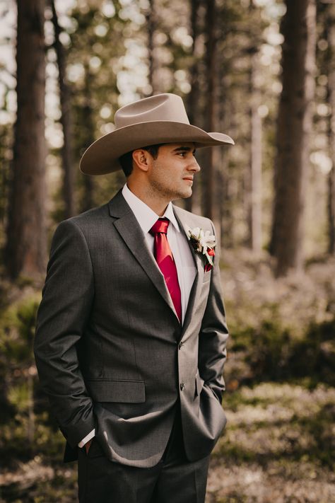 Gray and burgundy groom suit with cowboy hat Cowboy Groomsmen Burgundy, Groom Suit With Cowboy Hat, Groom Suit Country Wedding, Suits With Cowboy Hats, Cowboy Hats For Wedding, Groom Suit Cowboy, Wedding Suits Country, Cowboy Hat With Suit, Cowboy Wedding Suit