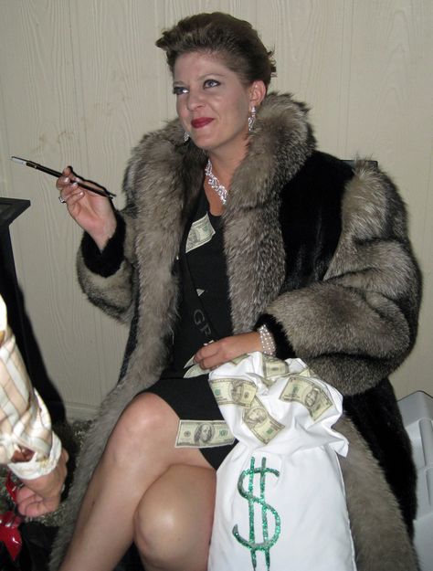 West African Party Theme | Murder Mystery Games | www.bepartofthemystery.com | https://www.etsy.com/shop/MurderMystery101 Rich Wife Costume, Millionaire Costume Ideas, Rich Halloween Costume, Money Costume Ideas, Rich Person Costume, Money Costume Women, Mob Wife Halloween Costume, Millionaire Costume, Money Halloween Costume