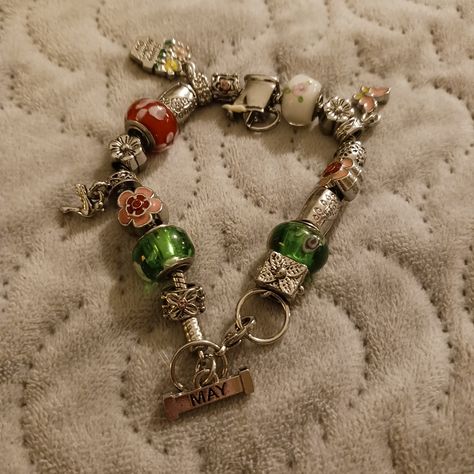 This Is New, Ordered Online So It Never Had Tags Attached, But It's In Excellent Condition, No Damages! Cute Charms That All Have To Do With The Month Of May! This Would Make A Perfect Gift!! All Charms Are In Perfect Condition, No Tarnishing, Etc! This Was Never Worn, Just Sat In One Of My Jewelry Stands For Quite Some Time!! Please Look At All Photos, Zoom In, Selling As Is! Price Is Firm Unless Bundled! Smoke Free, Pet Friendly! I Ship Same Or Next Day, Even Sunday's And Holiday's!! Cluttercore Jewelry, Funky Jewelry Silver, Mixed Metal Jewelry Stack, Madeleine Core, Charm Bracelet Aesthetic, Thrifted Jewelry, Thrift Jewelry, Vintage Heart Jewelry, Mint Jewelry