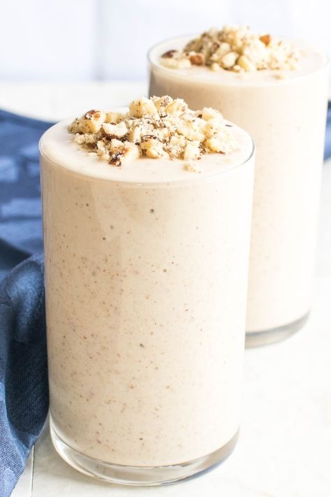 This Hazelnut Cheesecake Smoothie is thick, rich and creamy with smooth flavors. It’s a dessert for breakfast. This smoothie is made with real and healthy ingredients with lot of ease. Therefore, I found a great and healthier way to enjoy cheesecakes | V + GF | kiipfit.com Hazelnut Smoothie, Hazelnut Cheesecake, Unique Smoothies, Cheesecake Smoothie, Dessert For Breakfast, Best Smoothie, Yummy Smoothie Recipes, Best Smoothie Recipes, Good Smoothies