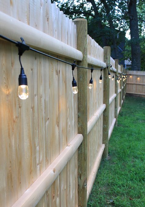 Backyard fence landscaping