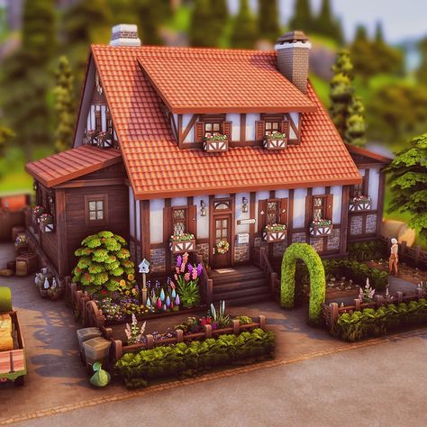 German farm in half-timbered style Hello Lovelies! Today I would like to share my build for #unityindiversitycollab hosted by @thegoldenage.builds with you. I thought I would build a german farm, with half-timbering and red roof tiles, like you can still see in Germany from time to time. The backstory and the basic idea are a bit sadder. Unfortunately, many beautiful old buildings and houses in this country are completely deteriorating. We have so many empty old houses where I live. This is... German Countryside Houses, Sims 4 German House, The Sims 4 Country House, Old German Houses, Red Roof Tiles, Bavarian House, Houses In Germany, Double House, German Houses