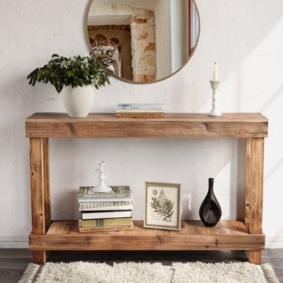 Our console table are made from solid wood that has been previously used in structures or other products and has naturally aged or weathered over time. This gives the table a rustic, distressed appearance with unique textures and colors that are characteristic of weathered wood. The use of reclaimed wood is often valued for its sustainability, as it repurposes existing materials, and for its aesthetic, which adds character and history to the furniture. COMFORTHOMI Table Base Color: Brown | COMFO Wood Console Table Entryway, Wood Entry Table, Narrow Console Table, Unique Textures, Furniture Table, Anna White, Entryway Table, Wood Console Table, Table Wood