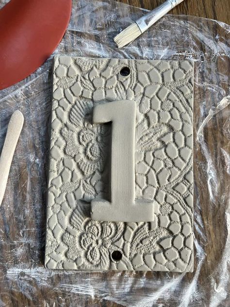 Hand Built B*tches | Made a few new house number signs | Facebook Clay House Number Plaque, Pottery House Numbers, Creative House Number Ideas, Clay Draping, House Number Tiles, Ceramic Sign, Farmhouse Studio, Stairs And Hallway Ideas, House Number Plate