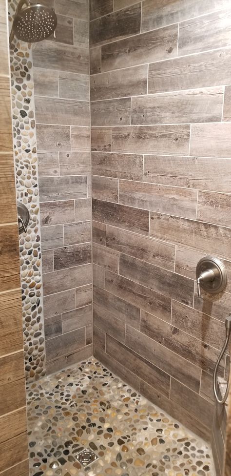 River Rock Tile Shower Ideas, Showers With Rock Floors, Master Shower Floor Ideas, Showers With River Rock Floors, River Rock Floor Bathroom, Cobblestone Shower Floor, River Rock Shower Floor Ideas, River Rock Bathroom Ideas, Rustic Walk In Shower Ideas Tile