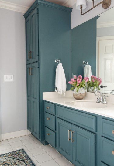 Trends are shifting once again, and right now, we are loving the popular bathroom colors we're seeing. We've noticed that these current hues, from blush to blues to greens, are fresh, saturated, and all-too-obviously nod to the outdoors. #hunkerhome #bathroom #bathroomvanity #bathroomvanityideas #vanityideas Bathroom Cabinet Colors, Bathroom Cabinet Makeover, Makeover Kamar Mandi, Beautiful Bathroom Vanity, Bathroom Improvements, Vinyl Decor, Upstairs Bathrooms, Trendy Bathroom, Bathroom Vanity Cabinets