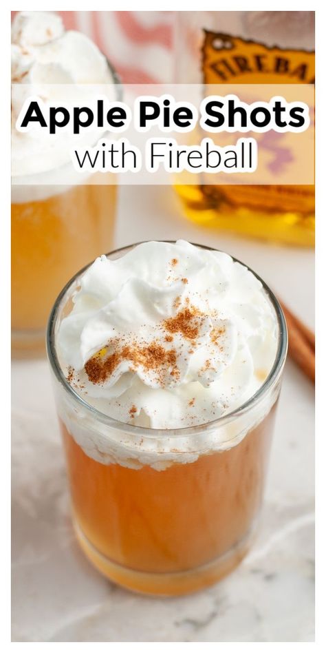 Shot glass with drink and whipped cream. Apple Pie Cocktail Fireball, Fall Shots Recipes, Hot Apple Pie Cocktail, Apple Pie Alcohol Recipe, Easy Fall Shots, Fireball Pumpkin Pie Shots, Pumpkin Pie Alcoholic Drink, Apple Shots Alcohol, Baileys Apple Pie Recipes Drinks